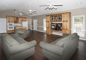 rec center with tv and couch